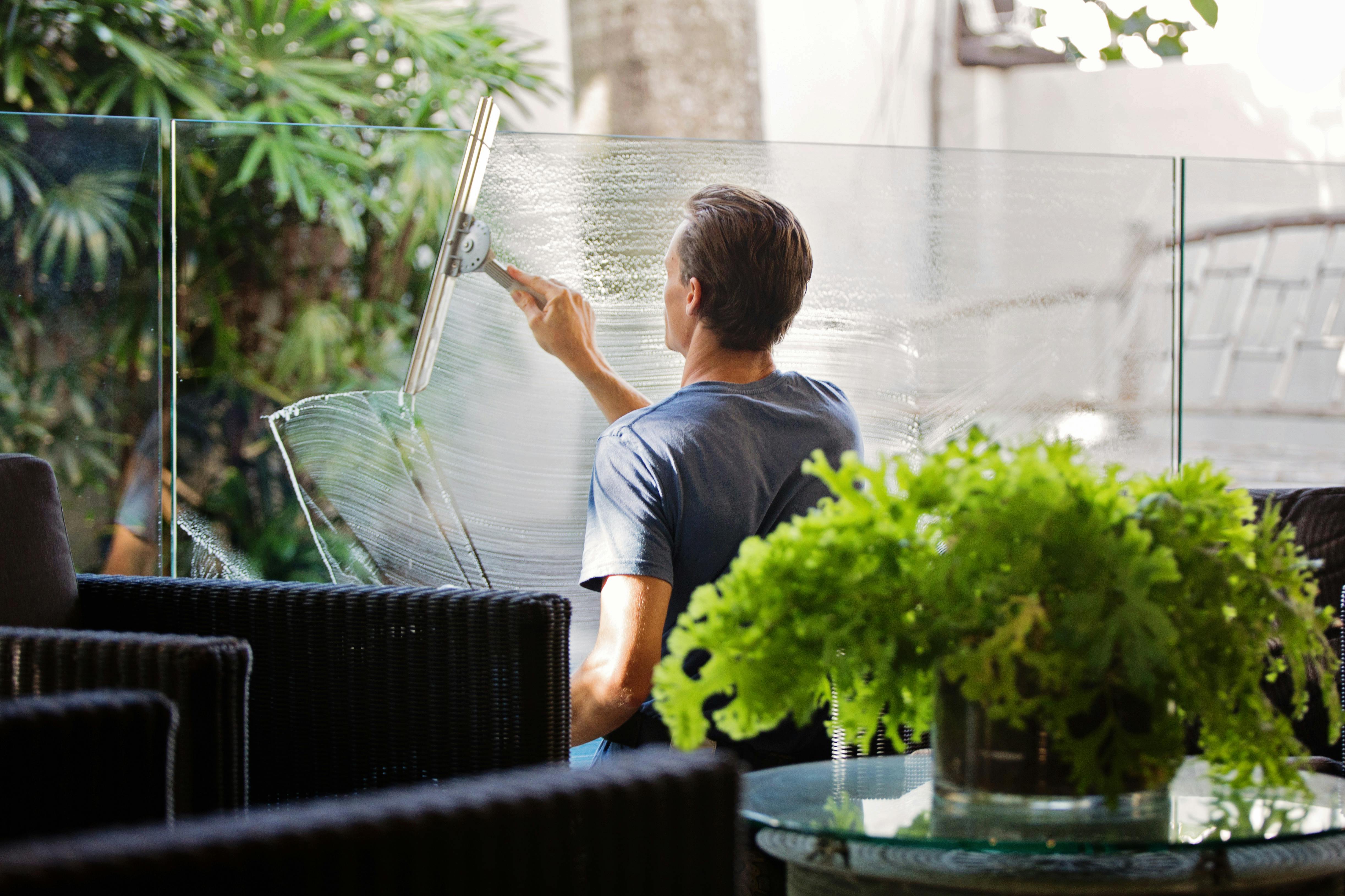 My-T-Brite team washing large office windows